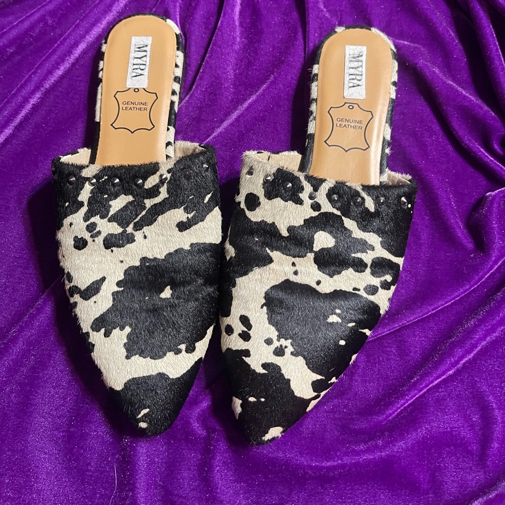 Myra cow print slip on mules